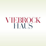 Logo der Firma Viehbrock Haus auf einem gelb grünlichen Hintergrund