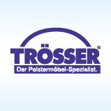 Logo von Möbel Trösser auf hellblauem Hintergrund