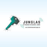 Logo von Junglas Sicherheitstechnik auf hellblauem Hintergrund.