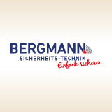 Logo von Bergmann Sicherheits-Technik mit goldenem Hintergrund.