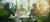 Gruppe von Personen in einem modernen Büro bei einer Besprechung, umgeben von großen Fenstern und grünen Pflanzen
