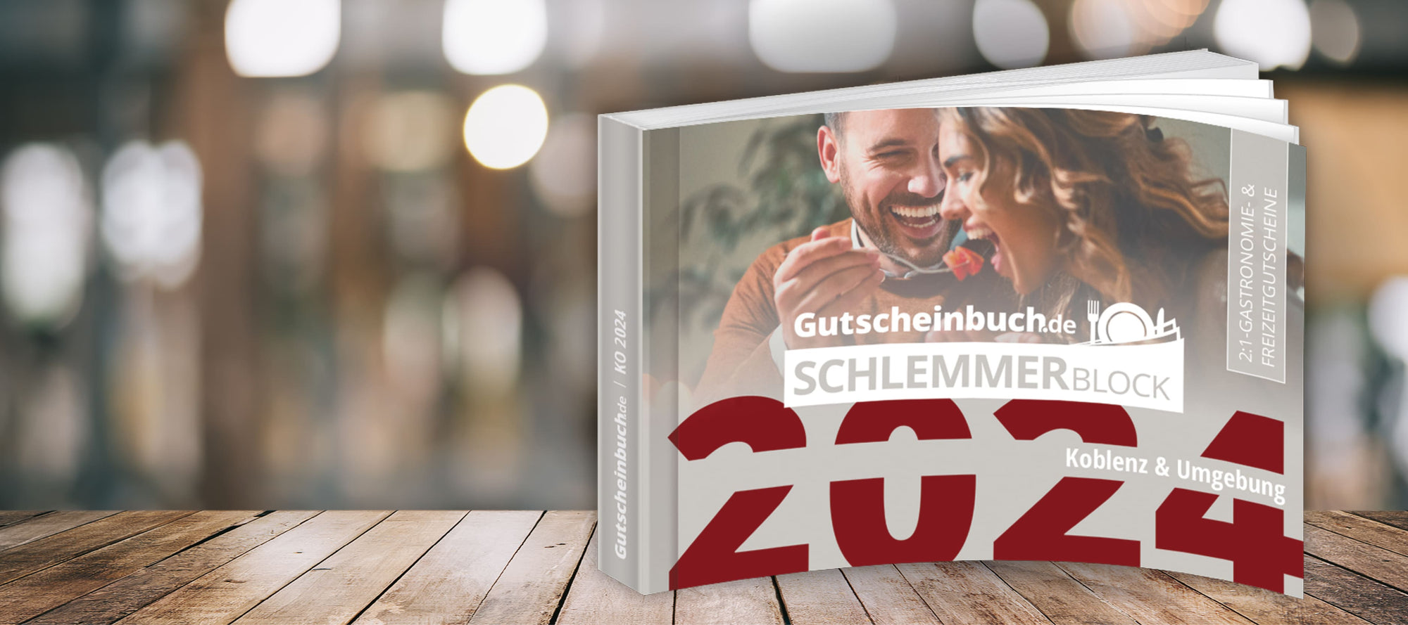 Der neue Schlemmerblock für die region Koblenz steht auf einem rustikalen Holztisch